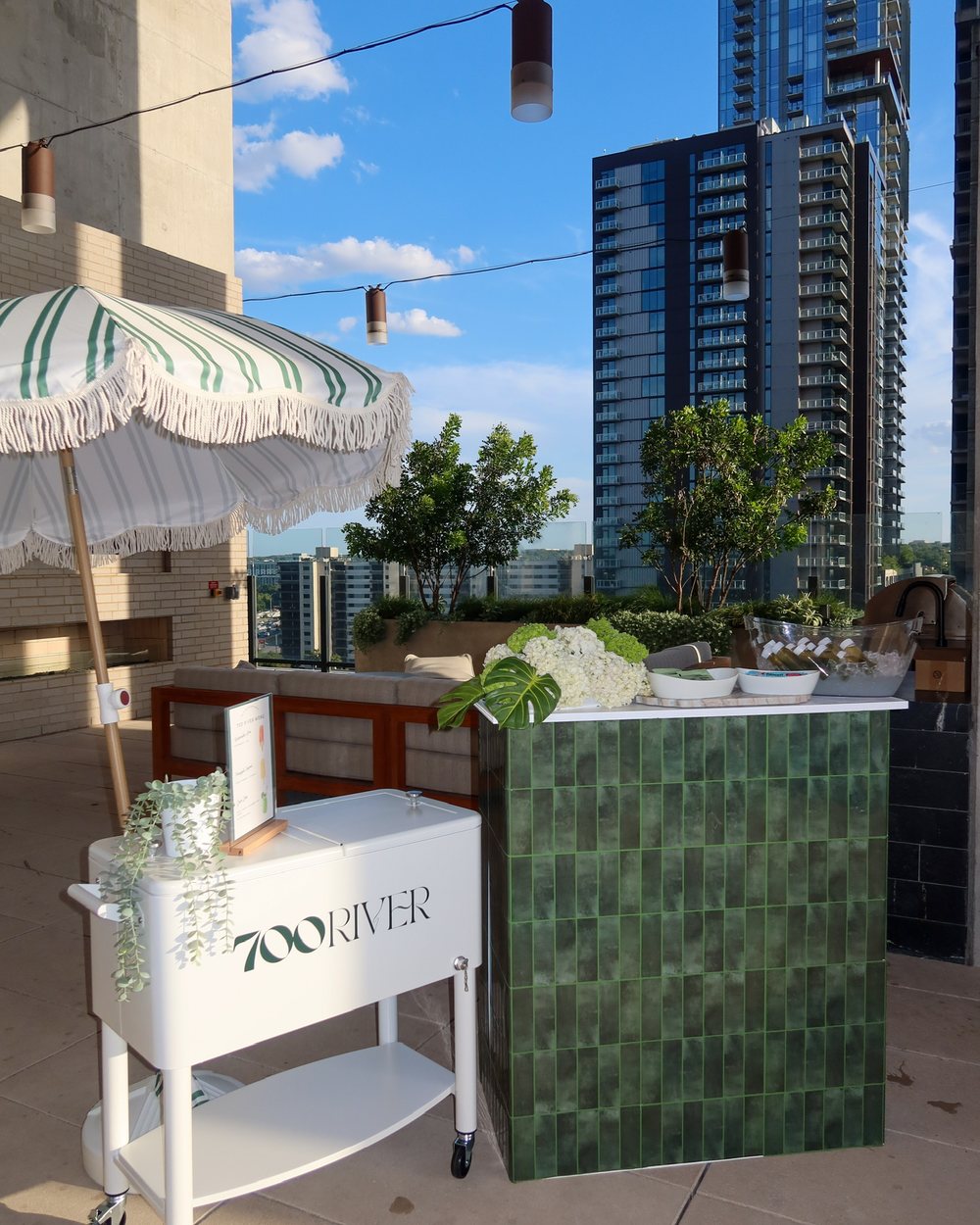 Branded popsicle cart on a rooftop terrace in Austin